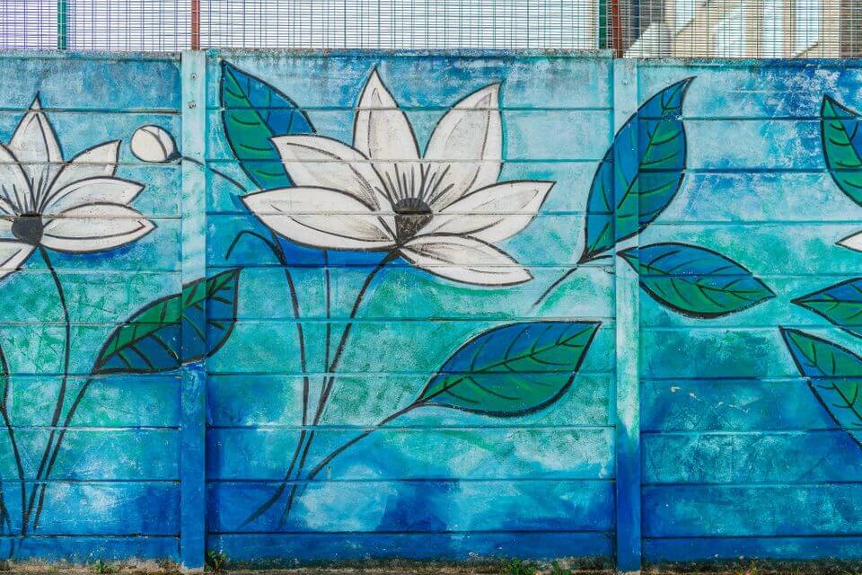 Painted flower on fence